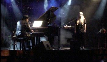 Grayson and Polly onstage at Old Timer's Garage, with bubbles, September 14, 2012.
