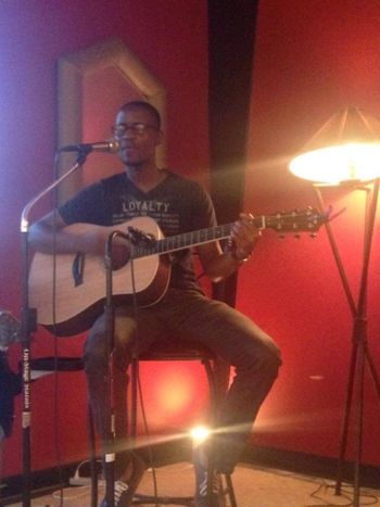 Voice Student CJ Dixon, performing at a Coffee House in N. Carolina.  I get proud to bursting when my students make it to the stage!
