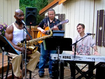 Pierre with Ollie McClay and Craig Bidondo Pierre performing with his brother Craig and Seattle Saxman Ollie McClay, at Shirley's Tippy Canoe in Troutdale, Oregon (featured on Diners, Drive-throughs and Dives, and Grimm!).
