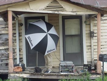 Blocking the wind at Willie Dixon's house, Vicksburg.  Hi-Tech!
