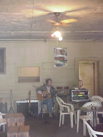 Jack Owens on the wall.  Skip James on the guitar.  Blue Front Cafe, Bentonia, MS
