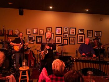 Tom_WThe_Silver_Tongued_Sevils_Grinders_restaurant__Shoreline_WA_copy The final music concert on 12/28/19 at Grinder's Restaurant in Shoreline, WA. featured the Silver Tongued Devils with John Hanford, guitar, Jakob Yansen, sax, me, Tim Scott, bass & vocal (keyboardist Pat Hues out of the photo left of JH).
