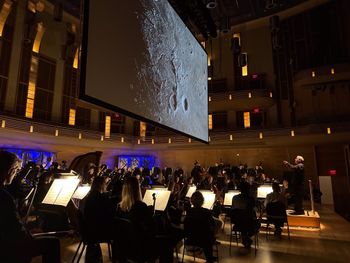 Maestro Gajewski conducts the National Philharmonic. Photo Credit: NASA/Wade Sisler
