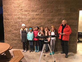 GIRL SCOUTS AND iRENE BARON TEACHING ABOUT TELESCOPES
