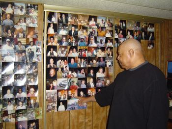 The walls of Sweet Baby James' home are covered with photos, and he has a story for each one
