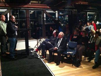 Ali speaks at the launch with Faris, survivor of the SIEV X
