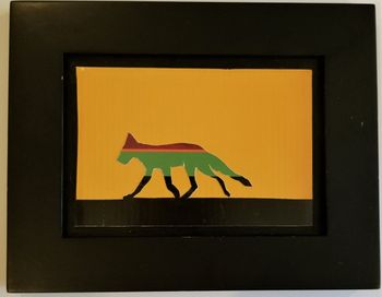 Miami Vice Fox. From a photo by Eric Struve. Calendar clippings and non-toxic glue on cardboard in black frame, behind glass. 7 1/4" x 9 1/4" in frame. 2019. $20
