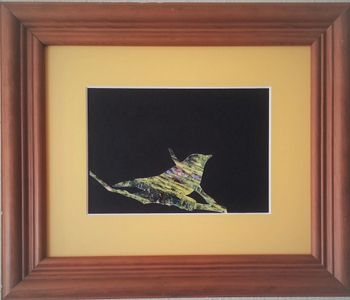 Warbler in Yellow, Purple, and Green. Calendar clippings and non-toxic glue on matboard in brown frame. 10 1/2" x 12 1/4" in frame. 2023. $45
