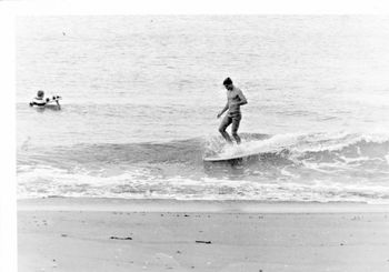 Brett Knight and Mike Cooney...Pataua winter of '64 playing around on a little Pataua shorebreak,,,water about 15 degrees...notice Bretts football jersey...no wetsuits then ....just t-shirts or footy jerseys..brrrrrrrr !...
