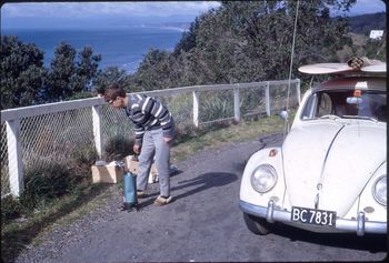 got he's slippers on this time....all the comforts of home!!... tea time again ...overlooking 'Mahia' Peninsula...Neville Ray..autumn of '68 doing one of those awesome surf trips....and Mahia was getting some good press by '68....
