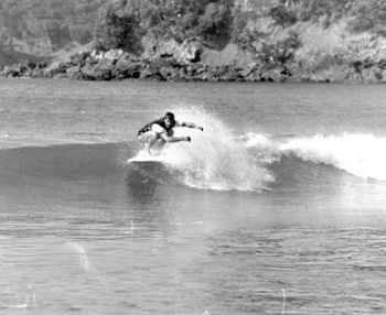 Johnny Bruce doing the crouch thing on a little winters Pataua high tide peak!.. Johnny was wearing one of those diving vests with the flap.......just so uncomfortable for surfing!!

