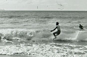 in fact it was so new to us.. we would ride 1ft shorebreaks breaking 10ft off the beach......and we thought that was awesome.....Tui about to get his ankles smacked by his board...Waipu ...summer of '62
