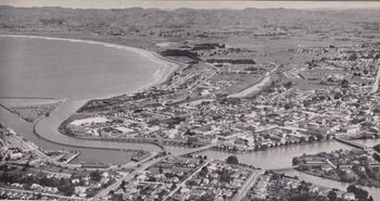 Gisborne 1952 pop. 19,000 Waikanae beach in the distance, and the home of some of the most awesome beach 'barrels' that ive ever had...summer of '68 living with 'legs' and bob hagner with barrels right out the front of our flat...'awesome'
