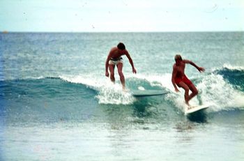 and here's Ian Butt dropping in on John Blomfield...Waipu '66 Johns signature move (in my mind) was his beautiful stylish drop-knee backhand turn...you may remember him for some other move...but he definitely was a classy surfer...no question about that!!!
