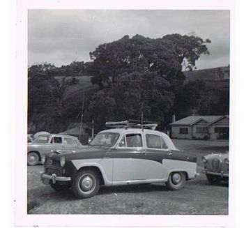 Terry Knews Austin Waipu Cove 1960....They rocked up in their 'woody' ....a 1955 Austin A50....im'e pretty sure Brett Knight had one of these cars as well!....great little cars....column gear change if i remember rightly!....surfers all over NZ were about to bring alive some of these old classic surf wagons.......
