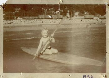Can you believe this!!....Milford Reef (Takapuna) boy Mike Tinkler... on a 'hollow stand up paddle board' in 1956...he even had that cheeky grin way back then...Ha!!
