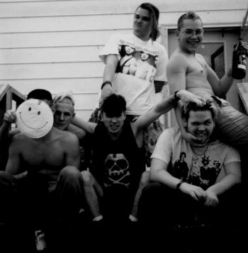 Political Prisoners line up. Mayville, Michigan, May, 1992. L to R: (Top) Forbisquis - Bass, Joe Average - Rhythm Guitar, (Bottom) Kenny - Drums, Spanky Lux - Lead Guitar, Rikkir - Vocals, M.F. Delicious - Vocals.
