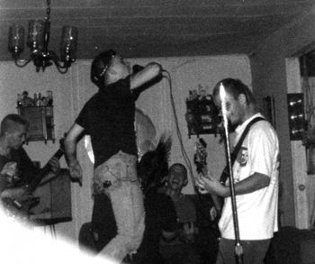 Band practice, Mayville, Michigan, July, 1992. Activate dual vocal interlock! From January of '92 to the spring of '93 we practiced @ the Stone residence, deep in the Michigan sticks. Where no one was close enough to mind the racket and the rumble.
