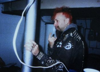 Band practice, 1995. #3 In a damp Michigan basement filled with smoke and noise, Jack Spinny declares his allegiance to the metal punk militia.
