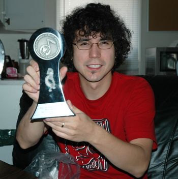 Garrison_With_Award Turtle Island Music wind Award for Best Compilation in 2008 @ Native American Music Awards

