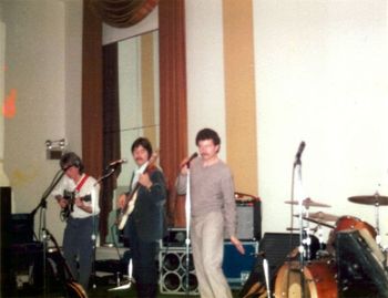 Ancient History #6 - One of various anonymous bands during the '80s. Maybe a country band (see banjo!) Maybe some freebie wedding gig while  band was still in rehearsals. Never dressed like that for any REAL gig! I see I still owned the '61 Jazz bass - sigh.
