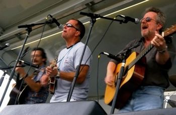 Brewflies (l. to r.: Bill, Jeff Schmich, Larry) on stage at Long Island Bluegrass Festival, 2008
