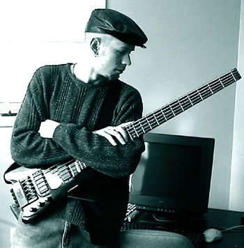 David Vector with Steinberger 5-string while working on the "Go" album
