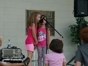 Alaina_and_Samantha_singing_at_Kimberly_Amphitheater
