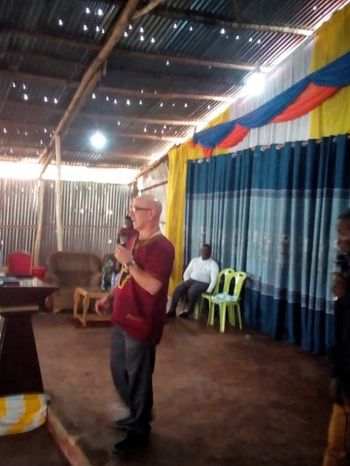 Preaching at Red Gone White Church in Nsangi, Uganda David working on 'Stirring the Sleeping Giant" in Nsangi.
