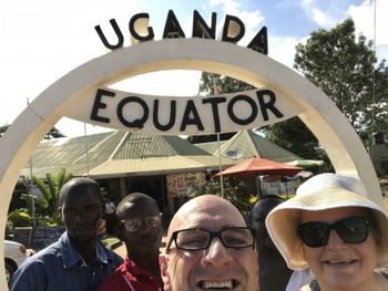 David, Robin and buddies at the Equator in Uganda Godfrey (driver), Nicholus (worship leader), David, Epaphras (Pastor) and Robin.
