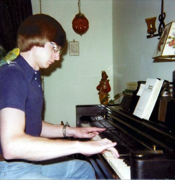 PRACTICE Early 80's, classical practice on the Wurlitzer for my master's degree w. Woodstock on my shoulder.
