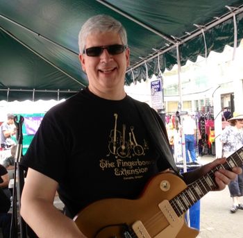 Phankl at Portland Saturday Market Proudly wearing the Fingerboard Extension T-shirt
