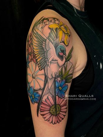 Swallow and Flowers Tattoo by Shari Qualls at Lucky Bella Tattoos in North Little Rock, Arkansas
