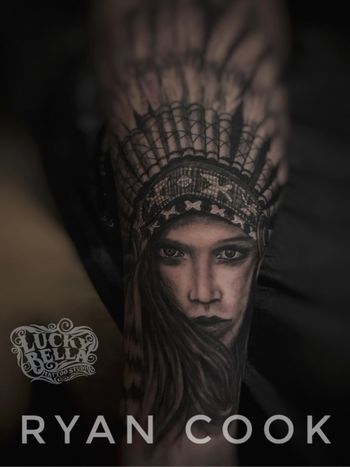 Native Girl Native American Girl face with traditional headdress in black and gray on forearm.
