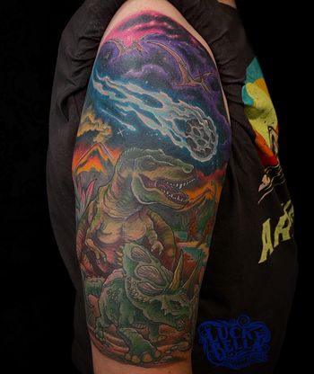 Dinosaur Half Sleeve by Howard Neal at Lucky Bella Tattoos in North Little Rock, AR
