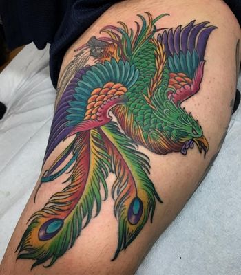 Traditional Japanese Pheonix A large traditional Japanese style Pheonix with various colors on upper thigh.
