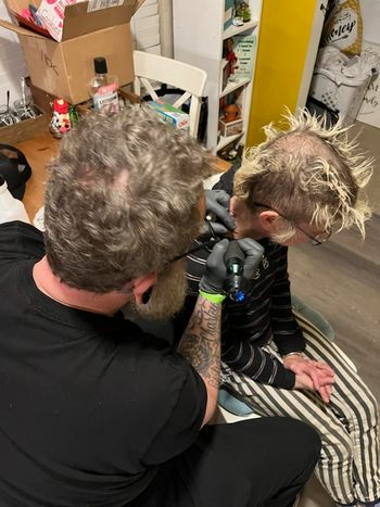 Gen Asholy from Anarchy for Assholes getting tattooed by Mylo Pig
