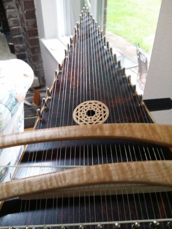 Tenor psaltery with bows 2015 Made from cocobolo wood--extremely dense and heavy.
