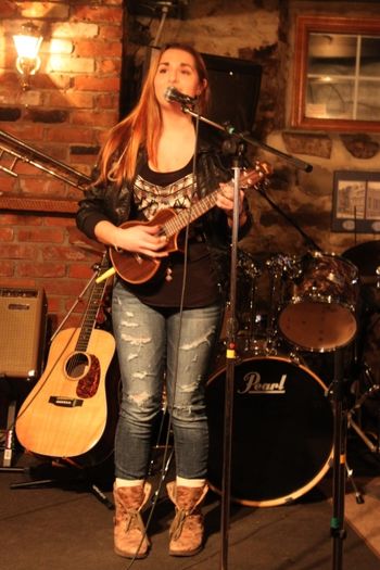 Photo #2 Chanelle (with ukulele) performs her original song "Home" at her first gig which was held at the Village Pub & Eatery in Burk's Falls, Ontario on February 21, 2014. A Big Thank You to Bob Gray and Peter Hall!!!
