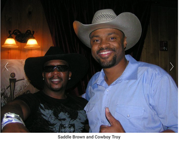 Saddle_Brown_and_Cowboy_Troy
