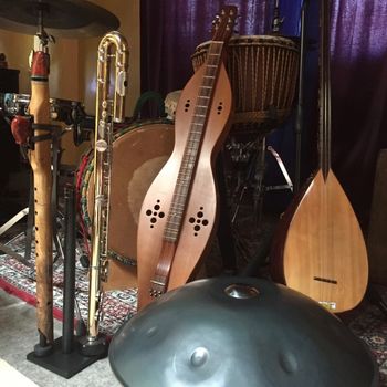 Some of our instruments A corner of our studio...Native American flute by Woodsounds, Yamaha alto flute, bass dulcimer and saz with all kinds of drums from Motherland Music in the background!
