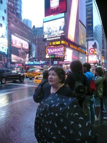 Margaret in rainy Tmes Square...
