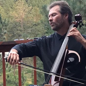 Cellist, Daniel Gaisford in South Dakota Performing on the Yamaha SVC-210 silent cello in an outdoor concert.