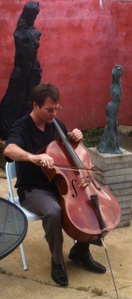 Cellist, Daniel Gaisford in Haverford, PA In the garden of Sculptor, Christopher Cairns before a performance of the Michael Hersch Sonatas for Unaccompanied Cello. Landon Goffriller Cello