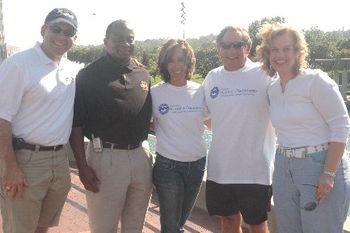 T.V, Anchor (John Oakey)(Left) & Police Chief (Thomas Warren) (2nd from Left) are Big Fans
