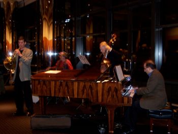 Phil Orch Jazz at Lincoln Center's Kaplan Penthouse, 2005. (l. to r.: Adam Unsworth, horn; Don Liuzzi, drums; Lee Gravagno, bass; Adam Glaser, piano)
