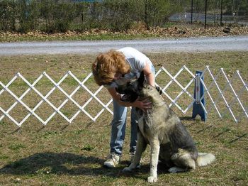 Step 6: When you return to your dog, REMEMBER TO GIVE LOTS OF PRAISE AND LOVE FOR A JOB WELL DONE.
