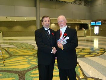 Dennis presenting a commemorative CD to Don Cherry
