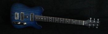 Little Lippi - Model T in Dazzling Blue - Photo by Evan Nichols Handcrafted in The USA - McNelly Pickups - Nitro lacquer by Jimmy B. instagram.com/jimmybguitars - Swamp-ash body - Quartersawn maple neck - 1-11/16 Nut - 10-16 fretboard radius - 25.5" scale - HipShot Bridge - 3-way reverse wiring harness
