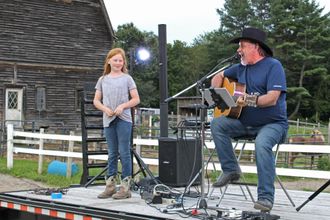 I had to sing a song to my sponsor's daughter, Erin Hance, at the Westport, NY Concert. Her favorite song was "All My Exes Live in Texas." She was so shocked but loved every minute of it.